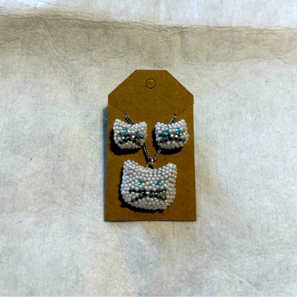 White cat rhinestone pendant and earrings